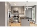 1210-11 Mahogany Row Se, Calgary, AB  - Indoor Photo Showing Kitchen With Stainless Steel Kitchen With Double Sink With Upgraded Kitchen 