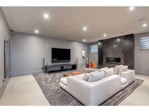 4248 Britannia Drive Sw, Calgary, AB - Indoor With Fireplace