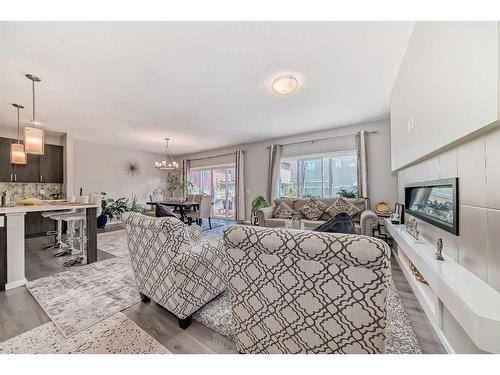 17 Walgrove Manor Se, Calgary, AB - Indoor Photo Showing Living Room With Fireplace