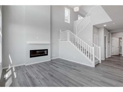 145 Homestead Terrace Ne, Calgary, AB - Indoor With Fireplace