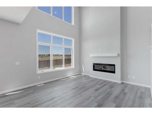 145 Homestead Terrace Ne, Calgary, AB - Indoor Photo Showing Living Room With Fireplace