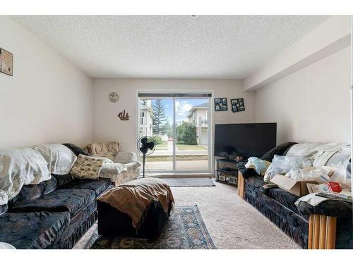 2102-2600 66 Street Ne, Calgary, AB - Indoor Photo Showing Living Room