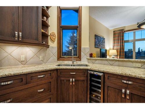 64 Heritage Lake Drive, Heritage Pointe, AB - Indoor Photo Showing Kitchen With Double Sink