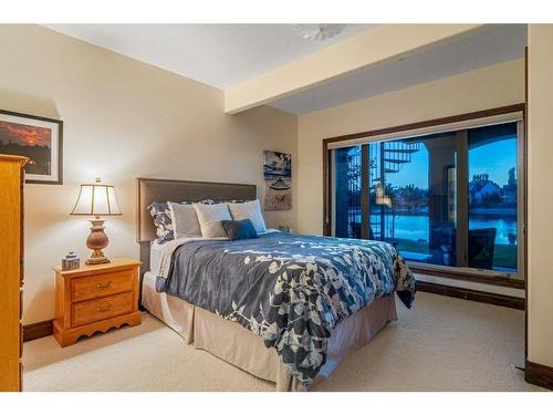 64 Heritage Lake Drive, Heritage Pointe, AB - Indoor Photo Showing Bedroom