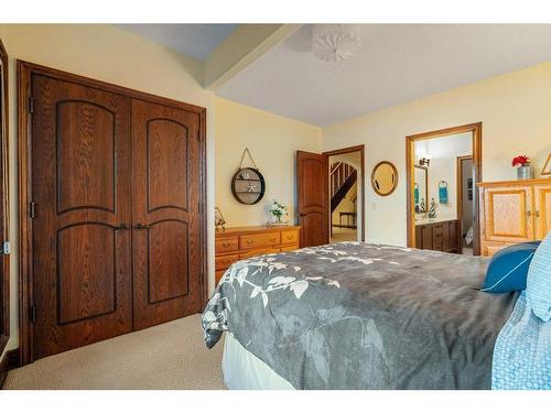 64 Heritage Lake Drive, Heritage Pointe, AB - Indoor Photo Showing Bedroom