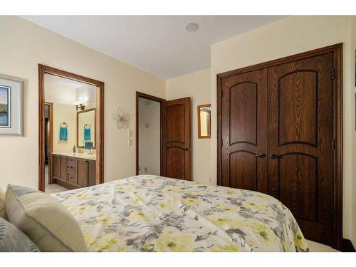 64 Heritage Lake Drive, Heritage Pointe, AB - Indoor Photo Showing Bedroom