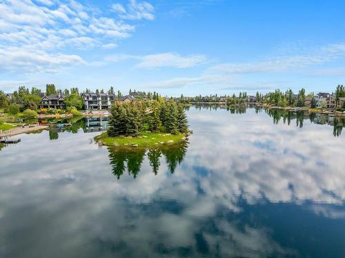 64 Heritage Lake Drive, Heritage Pointe, AB - Outdoor With Body Of Water With View