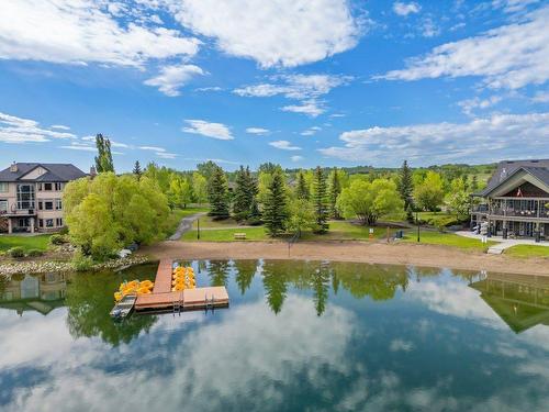 64 Heritage Lake Drive, Heritage Pointe, AB - Outdoor With Body Of Water With View