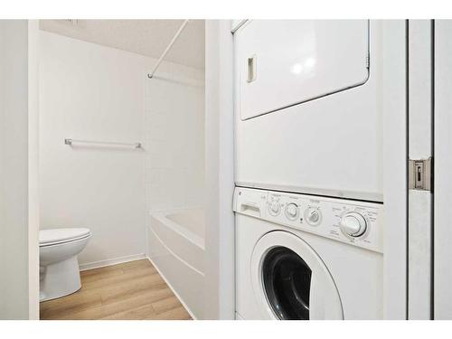 1218-2371 Eversyde Avenue Sw, Calgary, AB - Indoor Photo Showing Laundry Room