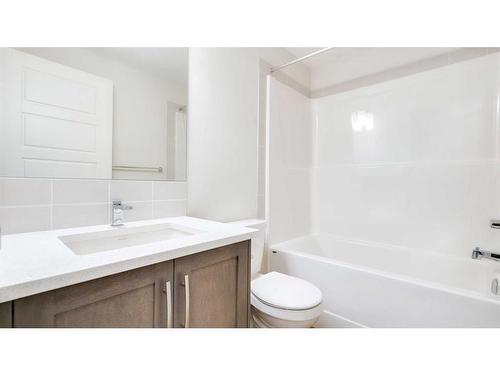 211-474 Seton Circle Se, Calgary, AB - Indoor Photo Showing Bathroom