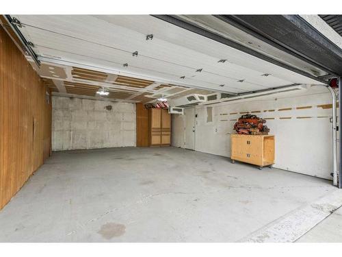 244 Queensland Road Se, Calgary, AB - Indoor Photo Showing Garage