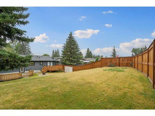 244 Queensland Road Se, Calgary, AB - Outdoor With Backyard