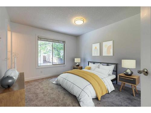 27 Meadowview Road Sw, Calgary, AB - Indoor Photo Showing Bedroom