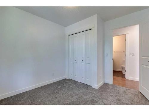 27 Meadowview Road Sw, Calgary, AB - Indoor Photo Showing Other Room