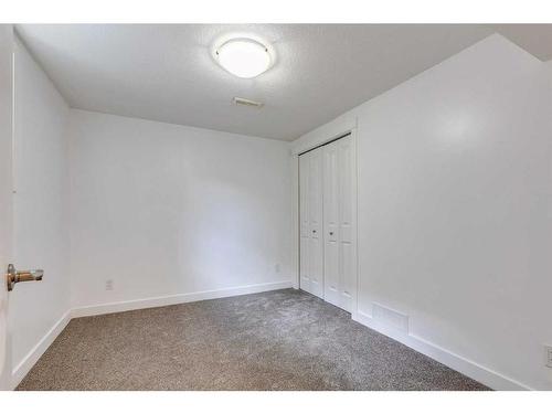 27 Meadowview Road Sw, Calgary, AB - Indoor Photo Showing Other Room