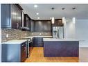 27 Meadowview Road Sw, Calgary, AB  - Indoor Photo Showing Kitchen With Upgraded Kitchen 