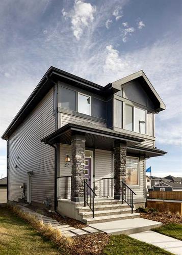 57 Shale Avenue, Cochrane, AB - Outdoor With Deck Patio Veranda