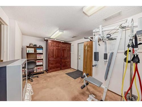 36 Edgehill Drive Nw, Calgary, AB - Indoor Photo Showing Gym Room