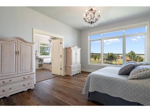 240 Brown Bear Point, Rural Rocky View County, AB - Indoor Photo Showing Bedroom