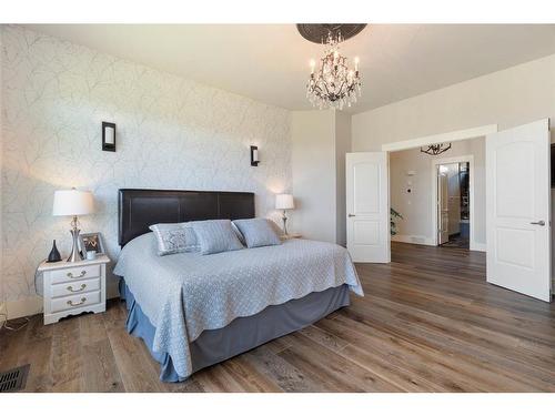 240 Brown Bear Point, Rural Rocky View County, AB - Indoor Photo Showing Bedroom