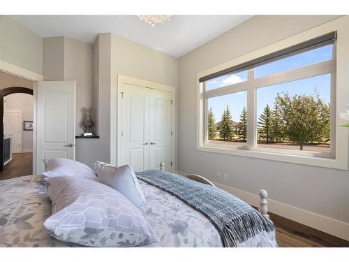 240 Brown Bear Point, Rural Rocky View County, AB - Indoor Photo Showing Bedroom