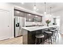 506-71 Shawnee Common Sw, Calgary, AB  - Indoor Photo Showing Kitchen With Stainless Steel Kitchen With Upgraded Kitchen 