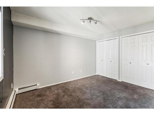 317-1717 60 Street Se, Calgary, AB - Indoor Photo Showing Other Room