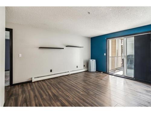 317-1717 60 Street Se, Calgary, AB - Indoor Photo Showing Other Room