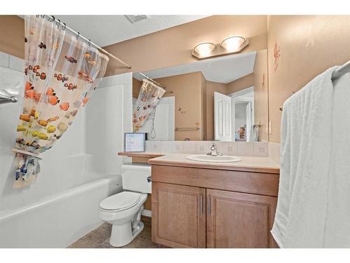 9 Crystal Shores Hill, Okotoks, AB - Indoor Photo Showing Bathroom