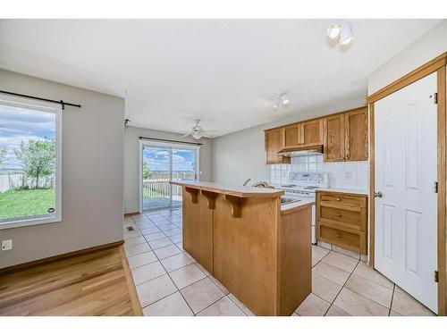 86 Hidden Hills Terrace Nw, Calgary, AB - Indoor Photo Showing Kitchen