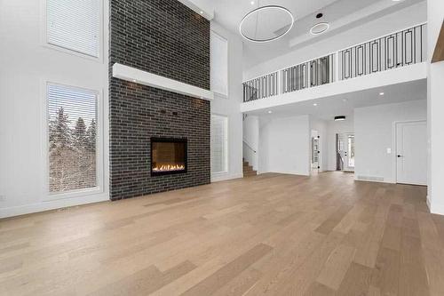 25 Timberline Court Sw, Calgary, AB - Indoor With Fireplace