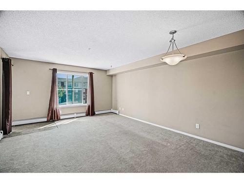 1311-81 Legacy Boulevard Se, Calgary, AB - Indoor Photo Showing Other Room