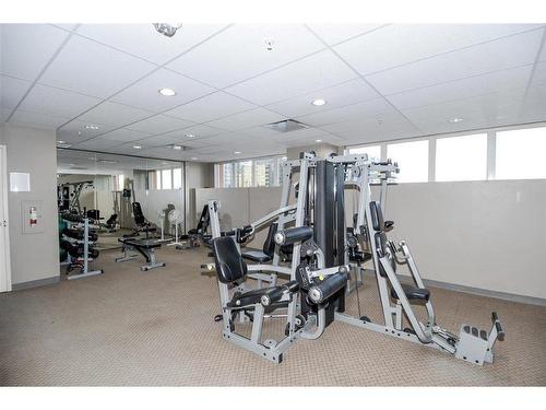 316-1053 10 Street Sw, Calgary, AB - Indoor Photo Showing Gym Room