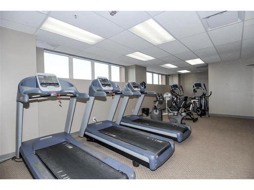 316-1053 10 Street Sw, Calgary, AB - Indoor Photo Showing Gym Room