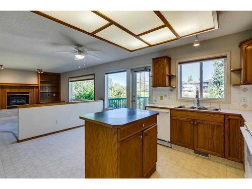 88 Sceptre Close Nw, Calgary, AB - Indoor Photo Showing Kitchen With Double Sink