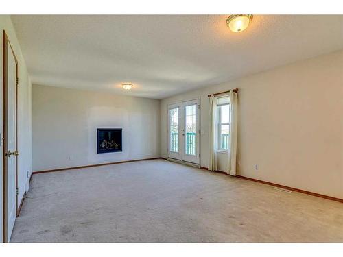 88 Sceptre Close Nw, Calgary, AB - Indoor With Fireplace