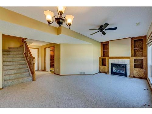 88 Sceptre Close Nw, Calgary, AB - Indoor With Fireplace