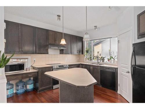 86 New Brighton Green Se, Calgary, AB - Indoor Photo Showing Kitchen With Double Sink With Upgraded Kitchen