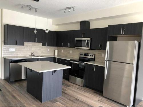 2402-298 Sage Meadows Park, Calgary, AB - Indoor Photo Showing Kitchen With Stainless Steel Kitchen With Upgraded Kitchen