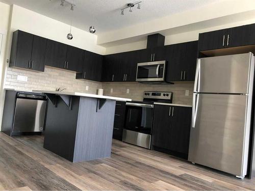 2402-298 Sage Meadows Park, Calgary, AB - Indoor Photo Showing Kitchen With Stainless Steel Kitchen With Upgraded Kitchen