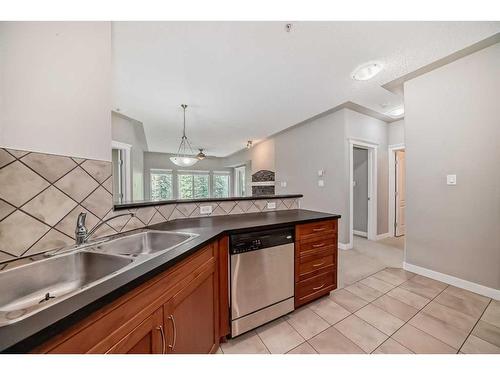 214-20 Discovery Ridge Close Sw, Calgary, AB - Indoor Photo Showing Kitchen With Double Sink