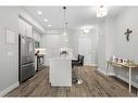 308-38 Quarry Gate Se, Calgary, AB  - Indoor Photo Showing Kitchen With Upgraded Kitchen 