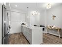 308-38 Quarry Gate Se, Calgary, AB  - Indoor Photo Showing Kitchen 