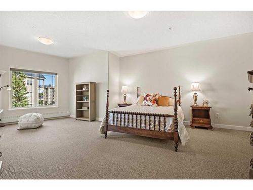 404-20 Discovery Ridge Close Sw, Calgary, AB - Indoor Photo Showing Bedroom