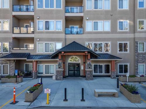 404-20 Discovery Ridge Close Sw, Calgary, AB - Outdoor With Balcony With Facade