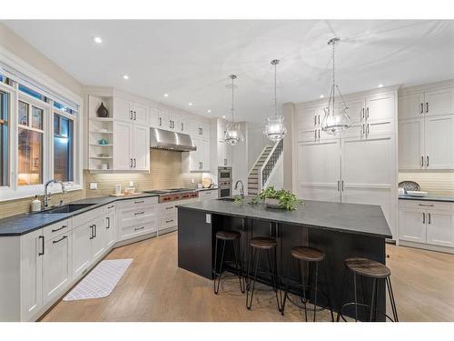 11 Elveden Place Sw, Calgary, AB - Indoor Photo Showing Kitchen With Double Sink With Upgraded Kitchen