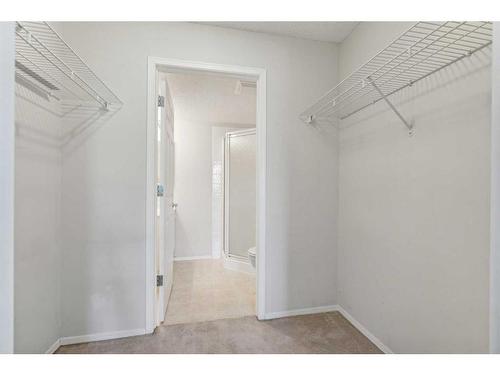 1203-928 Arbour Lake Road Nw, Calgary, AB - Indoor With Storage