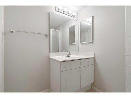 1203-928 Arbour Lake Road Nw, Calgary, AB - Indoor Photo Showing Bathroom