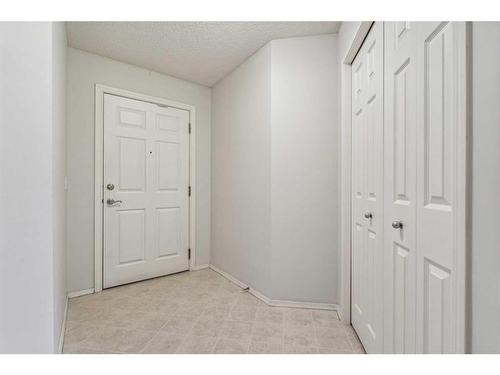 1203-928 Arbour Lake Road Nw, Calgary, AB - Indoor Photo Showing Other Room