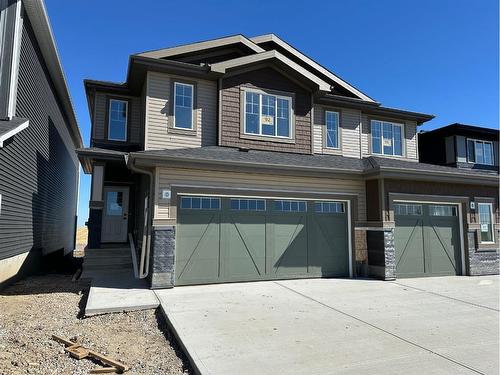 92 Sora Terrace, Calgary, AB - Outdoor With Facade